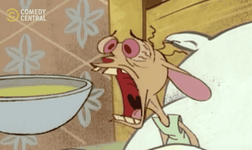 A Cartoon Character From Comedy Central Is Yawning In Front Of A Bowl Of Food GIF