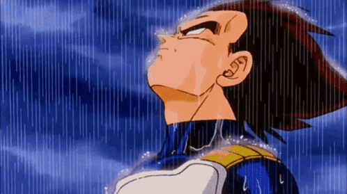 A Cartoon Character From Dragon Ball Z Is Standing In The Rain Looking Up . GIF