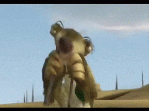 A Cartoon Character From Ice Age Is Standing In The Desert . GIF
