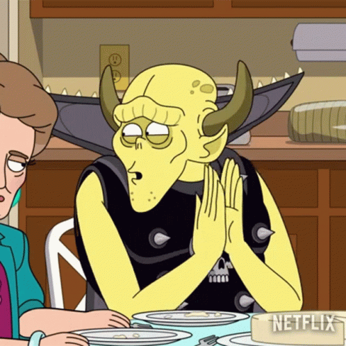Netflix Cartoon Sitting At Table With Plates GIF