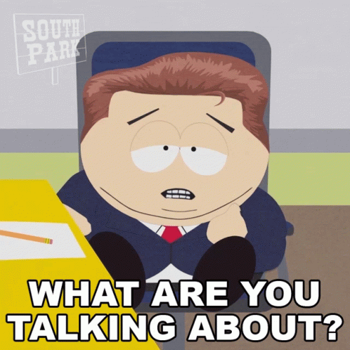 A Cartoon Character From South Park Is Sitting At A Desk And Asking What Are You Talking About GIF