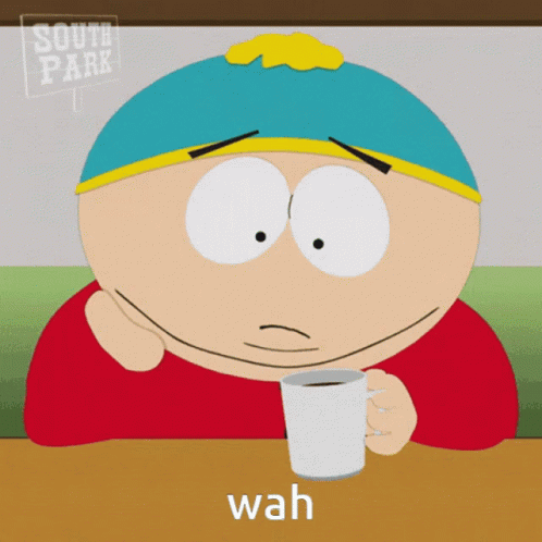 A Cartoon Character From South Park Is Sitting At A Table With A Cup Of Coffee GIF