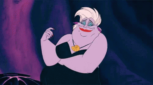 A Cartoon Character From The Little Mermaid Is Smiling With Her Arms Crossed And A Necklace Around Her Neck . GIF