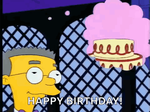 A Cartoon Character From The Simpsons Is Standing Next To A Cake With A Pink Wig . GIF