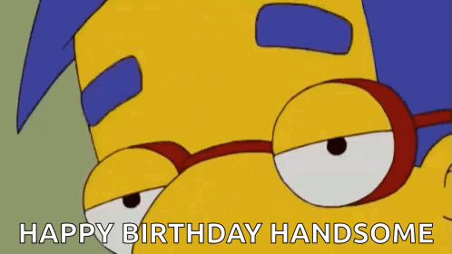 A Cartoon Character From The Simpsons Is Wearing Glasses And Says `` Happy Birthday Handsome '' . GIF