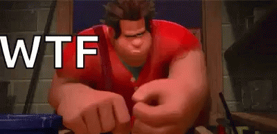 A Cartoon Character From Wreck It Ralph Is Sitting At A Table With His Hands Outstretched . GIF