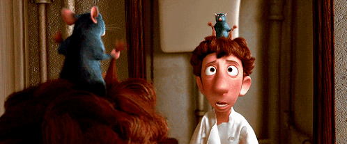 A Cartoon Character Has Two Mice On His Head GIF