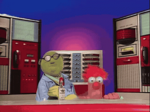 A Cartoon Character Holding A Bottle Of Beaker 'S Liquor Stands Next To Another Cartoon Character GIF