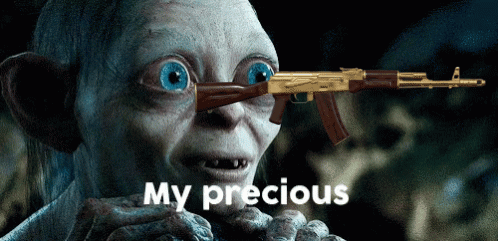 A Cartoon Character Holding A Gun With The Words My Precious Below Him GIF