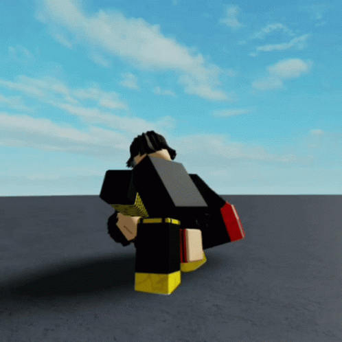 A Cartoon Character In A Black And Yellow Outfit Is Standing On A Gray Surface GIF