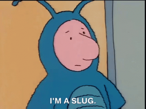 A Cartoon Character In A Blue Slug Costume Says `` I 'M A Slug '' . GIF