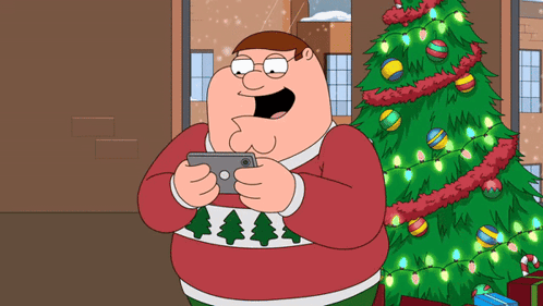 A Cartoon Character In A Red Sweater Is Holding A Cell Phone In Front Of A Christmas Tree GIF