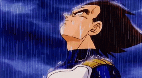 A Cartoon Character Is Crying In The Rain And Looking Up At The Sky . GIF