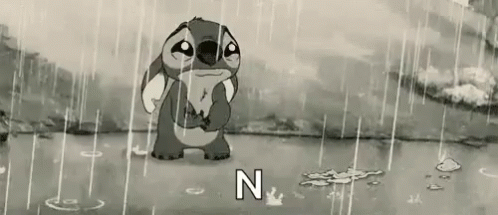 A Cartoon Character Is Crying In The Rain . GIF