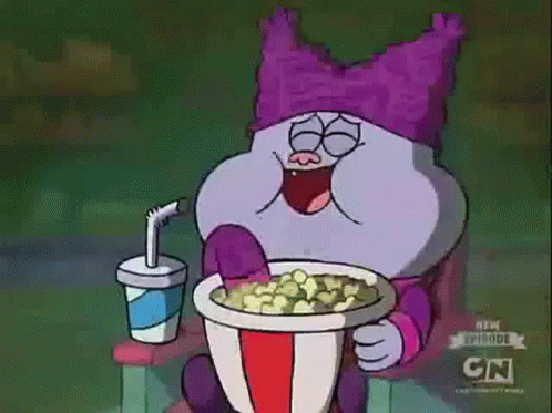 A Cartoon Character Is Eating Popcorn And Drinking A Soda GIF
