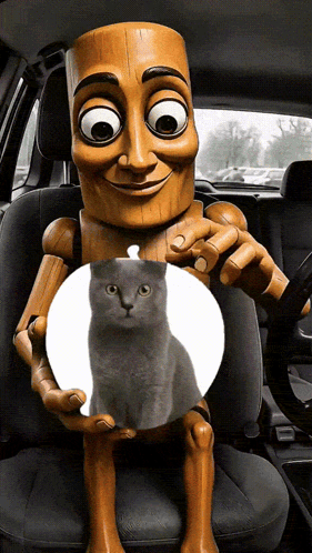 A Cartoon Character Is Holding A Cat In His Hands GIF