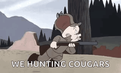 A Cartoon Character Is Holding A Gun In A Field And Saying `` We Hunting Cougars '' . GIF