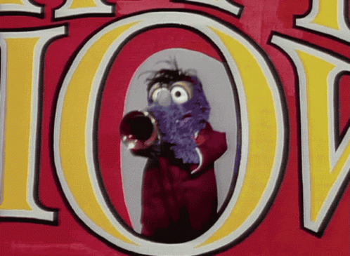 a cartoon character is holding a trumpet in front of a sign that says joy