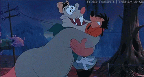 A Cartoon Character Is Holding Another Cartoon Character In His Arms GIF