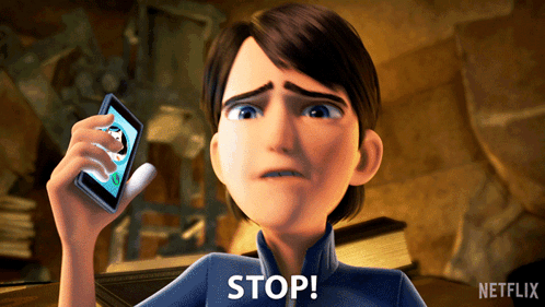 A Cartoon Character Is Holding Up A Cell Phone And Says " Stop " GIF