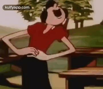 A Cartoon Character Is Laughing With His Mouth Open While Standing Next To A Picnic Table . GIF
