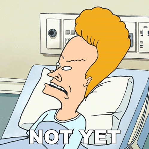 A Cartoon Character Is Laying In A Hospital Bed With The Words Not Yet Written On The Bottom GIF