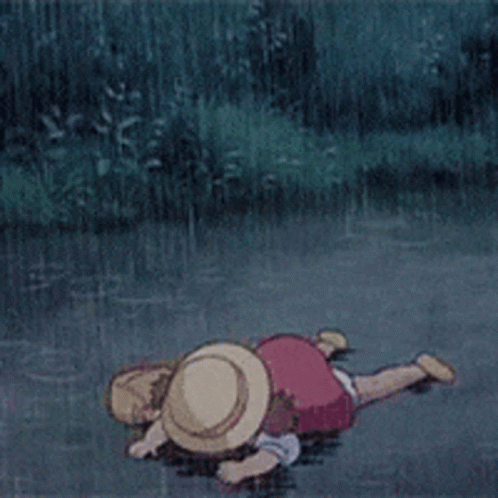 A Cartoon Character Is Laying In The Water Wearing A Hat GIF