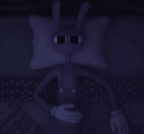 A Cartoon Character Is Laying On A Bed In The Dark GIF