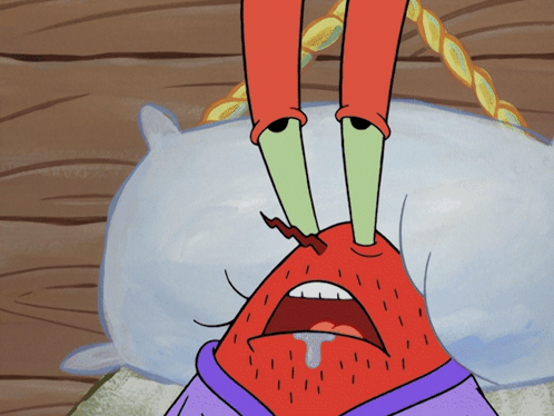a cartoon character is laying on a bed with a pillow