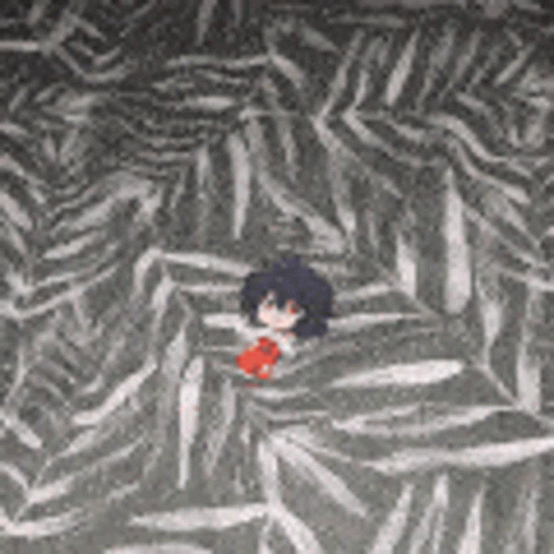 A Cartoon Character Is Laying On A Carpet With A Zebra Print . GIF