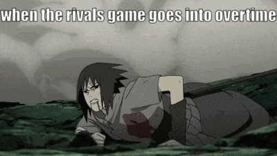 A Cartoon Character Is Laying On The Ground With A Sword In His Hand . GIF
