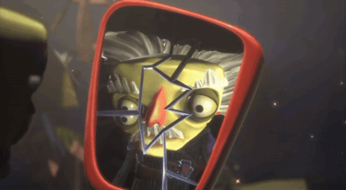 A Cartoon Character Is Looking At Himself In A Red Mirror GIF