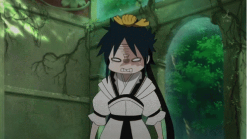A Cartoon Character Is Making A Funny Face And Has A Yellow Flower In Her Hair GIF