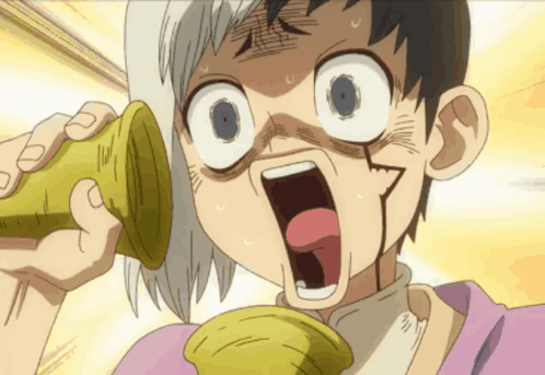 A Cartoon Character Is Making A Funny Face While Holding Something In His Hand GIF