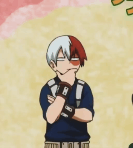 A Cartoon Character Is Making A Funny Face While Standing With His Arms Crossed . GIF