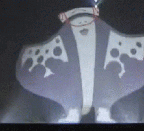A Cartoon Character Is Projected On A Wall . GIF