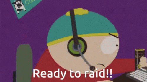 A Cartoon Character Is Sitting At A Desk With The Words " Ready To Raid " Written Below Him GIF