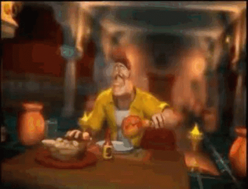 A Cartoon Character Is Sitting At A Table With A Bowl Of Food And A Bottle Of Sauce . GIF