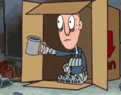 A Cartoon Character Is Sitting In A Cardboard Box Holding A Cup Of Coffee GIF