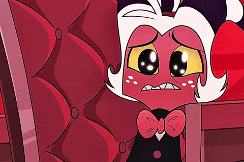 a cartoon character is sitting in a chair with a bow tie and a sad look on his face .