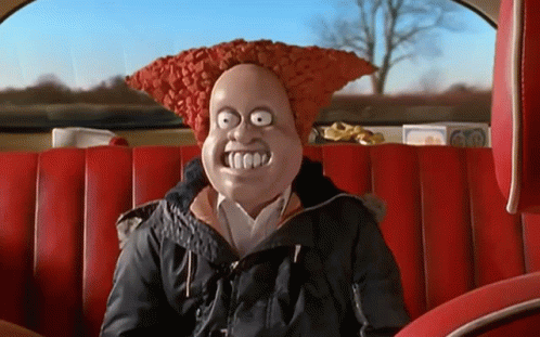 A Cartoon Character Is Sitting In The Back Seat Of A Car With A Huge Smile On His Face GIF