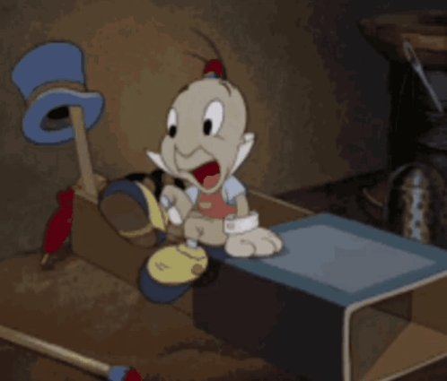 A Cartoon Character Is Sitting On A Box With The Words Goodnight Written Above Him GIF