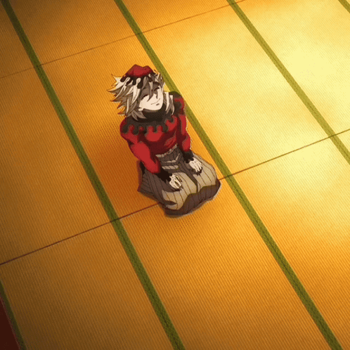 a cartoon character is sitting on a carpeted floor