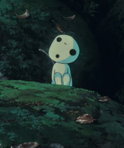 Cartoon Character Sitting On Grass Hill GIF