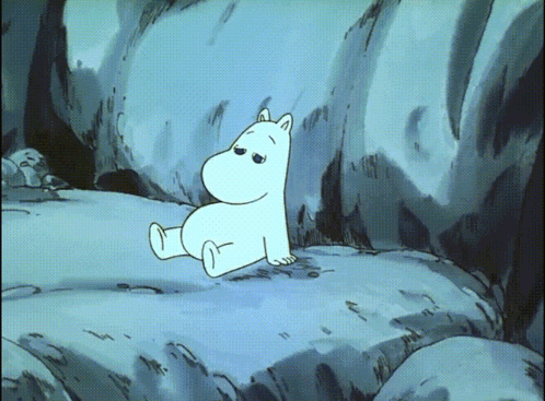 A Cartoon Character Is Sitting On A Rock With A Sad Look On His Face GIF