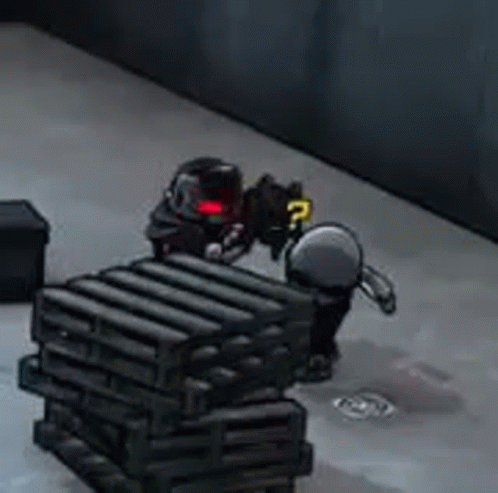 A Cartoon Character Is Sitting On Top Of A Stack Of Black Crates . GIF