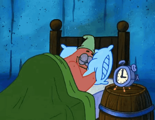 A Cartoon Character Is Sleeping In A Bed Next To An Alarm Clock That Says L On It GIF