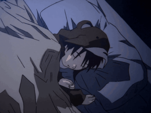 A Cartoon Character Is Sleeping In A Bed With A Hat On GIF