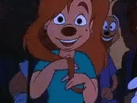 A Cartoon Character Is Smiling And Holding A Dog In Her Hand . GIF