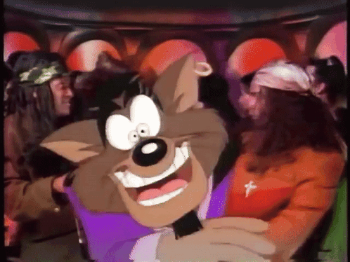 A Cartoon Character Is Smiling And Holding A Microphone In Front Of A Group Of People GIF